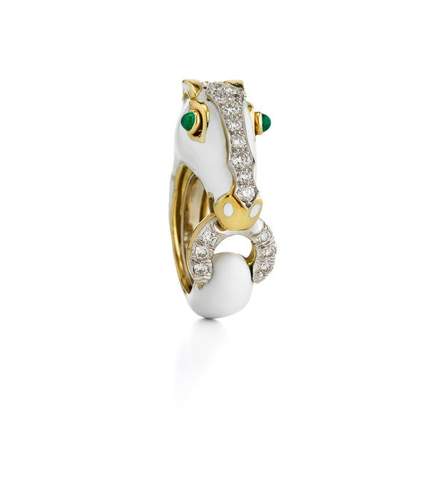 white enamel horse ring with emerald eyes, diamonds, and gold details