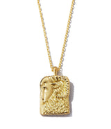 Aries zodiac pendant with gold ram design front side on 18k gold chain shown close up