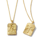 Aries zodiac pendants made from 18k gold, front and back shown side by side close up