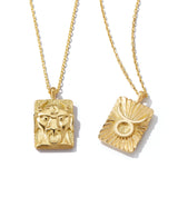 Taurus zodiac pendants made from 18k gold, front and back shown side by side on separate gold chains